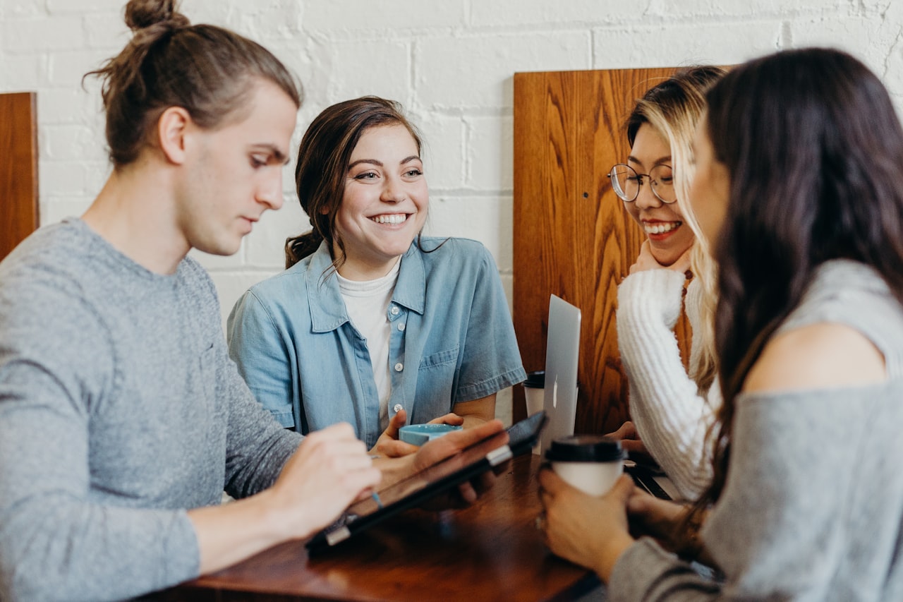 Students learning affiliate marketing fundamentals together in a study session